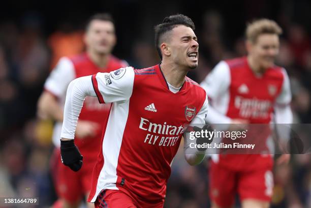 Gabriel Martinelli of Arsenal celebrates after scoring their sides third goal during the Premier League match between Watford and Arsenal at Vicarage...