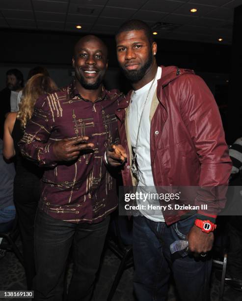 Leon Washington of the Seattle Seahawks and Devin Hester of the Chicago Bears attend the 2012 Celebrity Poker Tournament at the Indianapolis Zoo on...