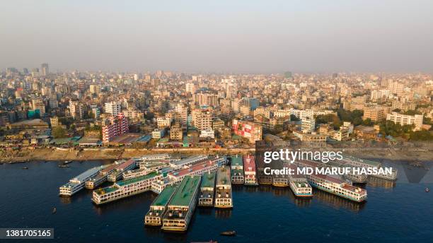 aerial view of sadarghat launch terminal dhaka bangladesh. dhaka city skyline - bangladesh stockfoto's en -beelden