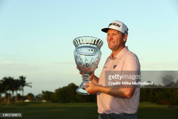 Ryan Brehm poses with the trophy on the 18th green during the final round of the Puerto Rico Open at Grand Reserve Golf Club on March 06, 2022 in Rio...