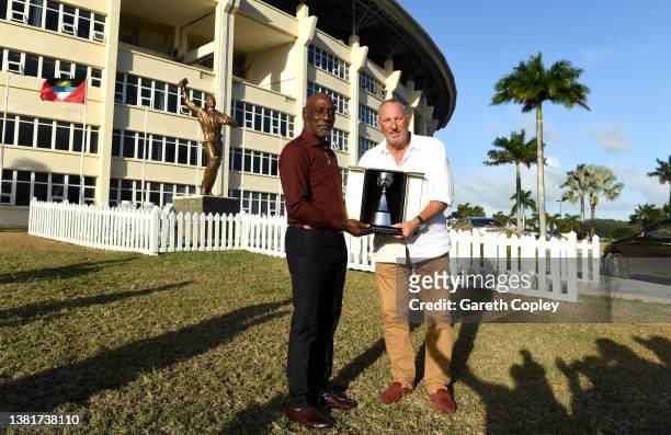 Former cricketers Sir Vivian Richards and Lord Ian Botham unveil the Botham Richard Test Series trophy at a media event at Sir Vivian Richards...