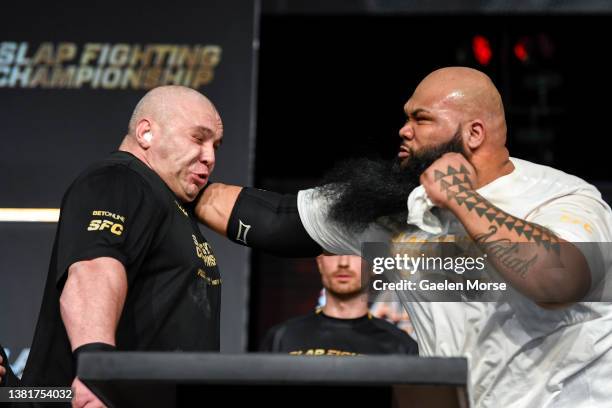 Koa “Da Crazy Hawaiian” Viernes slaps Dawid “Zaleś” Zalewski in the super heavyweight bout at the Arnold Sports Festival in Columbus Convention...