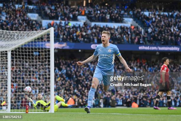 Kevin De Bruyne of Manchester City celebrates after scoring their sides first goal during the Premier League match between Manchester City and...