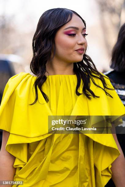 Avani wearing a yellow mini dress, is seen outside Valentino, during Paris Fashion Week - Womenswear F/W 2022-2023 on March 06, 2022 in Paris, France.