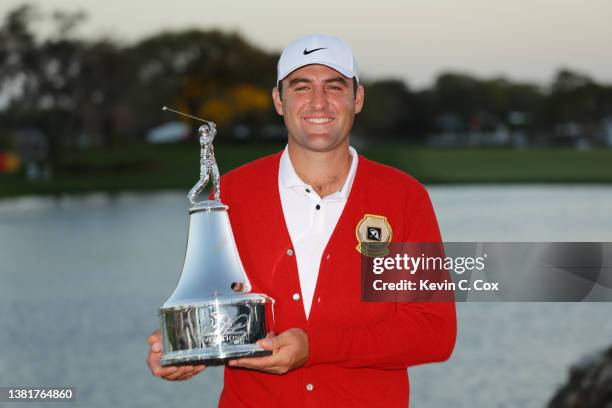 Scottie Scheffler of the United States poses with the trophy after winning the Arnold Palmer Invitational presented by Mastercard at Arnold Palmer...