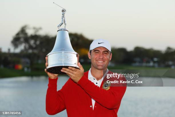 Scottie Scheffler of the United States poses with the trophy after winning the Arnold Palmer Invitational presented by Mastercard at Arnold Palmer...