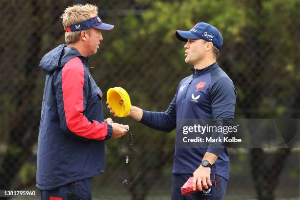 Rooster head coach Trent Robinson speaks to Cooper Cronk during a Sydney Roosters NRL training session at Robertson Road Synthetic Field on March 07,...