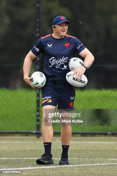 Assistant coach Brett Morris laughs during a Sydney Roosters NRL training session at Robertson Road Synthetic Field on March 07, 2022 in Sydney,...