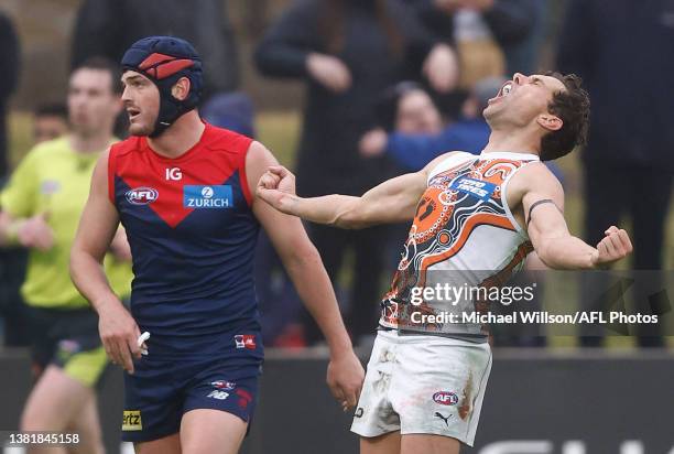 Josh Kelly of the Giants celebrates a goal during the 2023 AFL Round 16 match between the Melbourne Demons and the GWS Giants at TIO Traeger Park on...