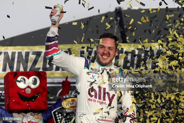 Alex Bowman, driver of the Ally Chevrolet, celebrates in victory lane after winning the NASCAR Cup Series Pennzoil 400 at Las Vegas Motor Speedway on...