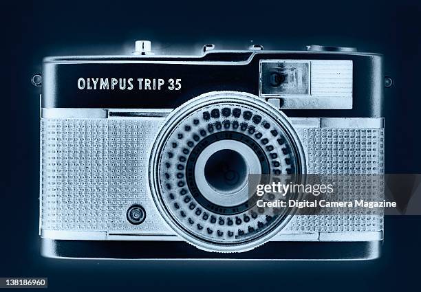 An Olympus Trip 35 camera highlighted with an X-ray effect, session for Digital Camera on February 16, 2011.