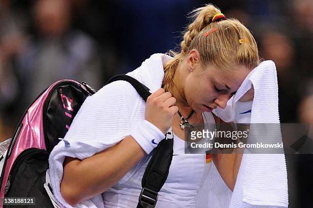 Sabine Lisicki of Germany cries after losing her single match against Iveta Benesova of Czech Republic during day one of the Federation Cup 2012...