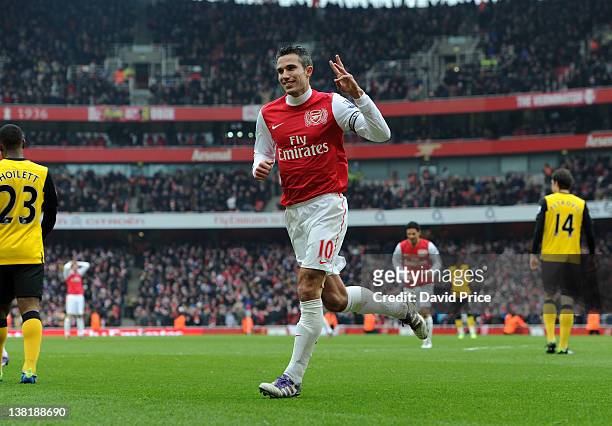 Robin van Persie of Arsenal celebrates completing a hatrick after scoring Arsenal's 6th goal during the Barclays Premier League match between Arsenal...