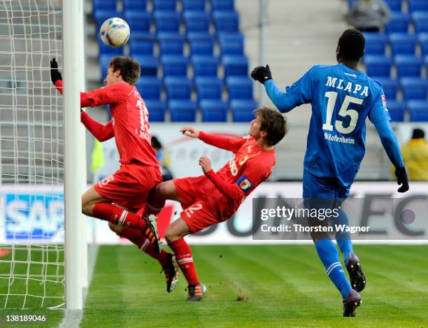 Peniel Mlapa of Hoffenheim is scoring his teams first goal during the Bundesliga match between TSG 1899 Hoffenheim and FC Augsburg at...