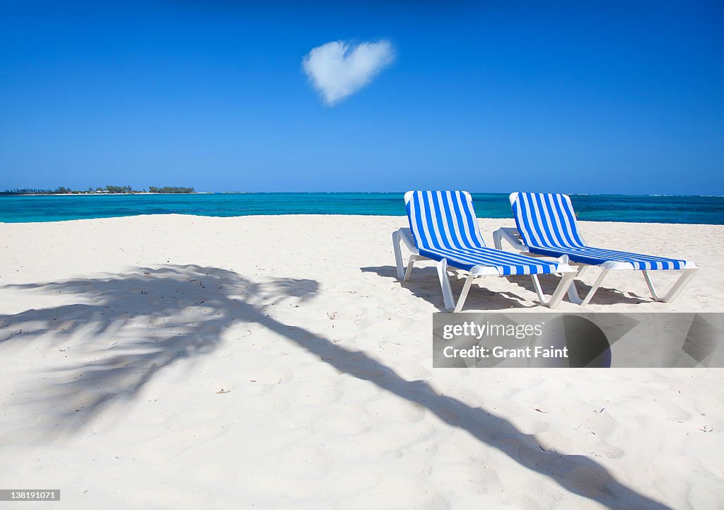 Two Beach lounge chairs.