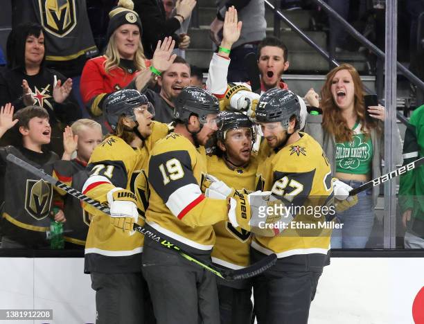 William Karlsson, Reilly Smith, Jonathan Marchessault and Shea Theodore of the Vegas Golden Knights celebrate Marchessault's second-period goal...