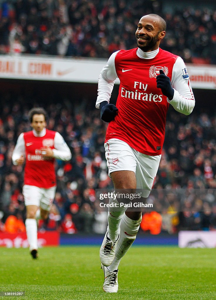 Thierry Henry of Arsenal celebrates after scoring Arsenal's seventh ...