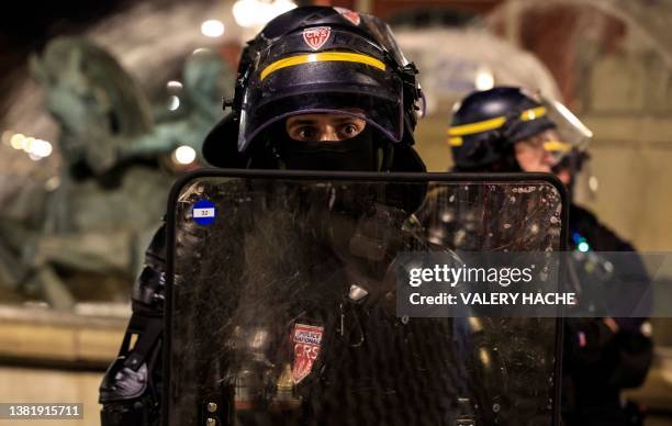 Riot police personnel patrol on a street in Nice, south-eastern France late July 1 during the fifth night of rioting following the shooting of a...