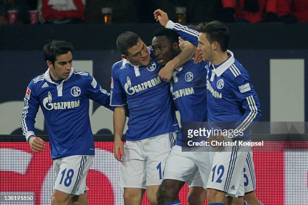 Chinedu Obasi of Schalke celebrates the first goal with Jose Manuel Jurado , Kyriakos Papadopoulos and Marco Hoeger during the Bundesliga match...