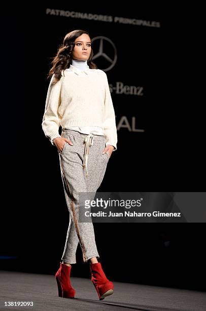 Model walks the runway in the TCN fashion show during the Mercedes-Benz Fashion Week Madrid Autumn/Winter 2012 on February 4, 2012 in Madrid, Spain.