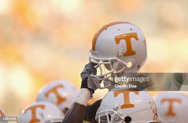 Tennessee Volunteer holds up his helmet in the team huddle before the NCAA football game against the Middle Tennessee State Blue Raiders at Neyland...