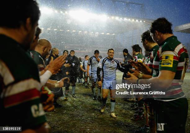 Jimmy Gopperth of Newcastle leads of his team applauded by the victorious Leicester Tigers during the LV Cup round four match between Leicester Tiger...