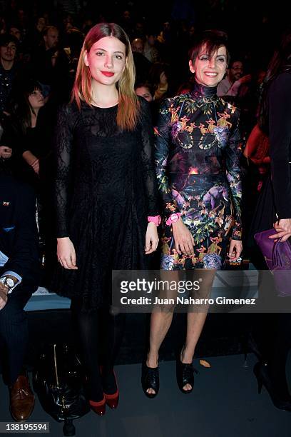 Miriam Giovanelli and Macarena Gomez attend the Carlos Diez and Maria Escote show during Mercedes-Benz Fashion Week Madrid A/W 2012 at Ifema on...