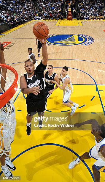 Chuck Hayes of the Sacramento Kings flips up a shot against the Golden State Warriors on January 31, 2012 at Oracle Arena in Oakland, California....