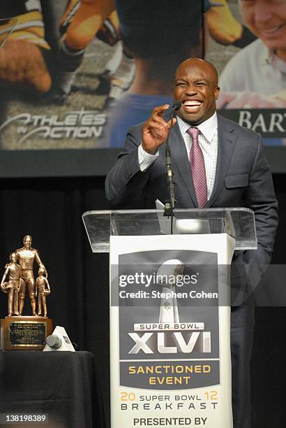 London Fletcher accepts the Bart Starr Award during the 25th Annual Super Bowl Breakfast at Exposition Hall at the Indiana State Fairgrounds on...