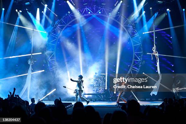 Bassist Nikki Sixx, drummer Tommy Lee, vocalist Vince Neil and guitarist Mick Mars of Motley Crue perform on the opening night of a month-long...