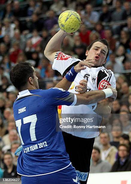 Dominik Klein of Germany in action against Vedran Zrnic of the Allstars during the All Star Game 2012 between Germany and the Handball Bundesliga...