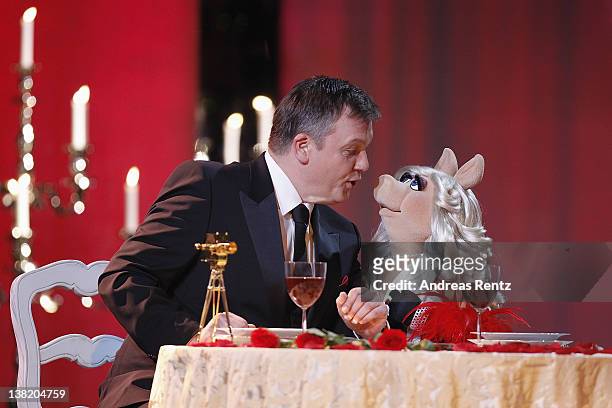 Hape Kerkeling and Miss Piggy seen on stage at the 47th Golden Camera Awards at the Axel Springer Haus on February 4, 2012 in Berlin, Germany.