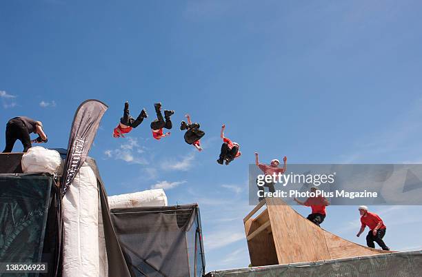 Composite of a roller-blader performing a flip off a half-pipe, taken on July 11, 2010.