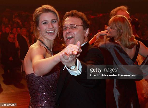 German Interior Minister Hans-Peter Friedrich dances with Britta Heidemann during the 2012 Sports Gala 'Ball des Sports' at the Rhein-Main Hall on...
