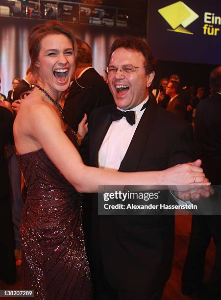 German Interior Minister Hans-Peter Friedrich dances with Britta Heidemann during the 2012 Sports Gala 'Ball des Sports' at the Rhein-Main Hall on...