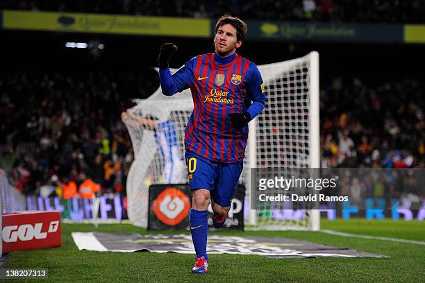 Lionel Messi of FC Barcelona celebrates after scoring his team's second goal during the La Liga match between FC Barcelona and Real Sociedad de...