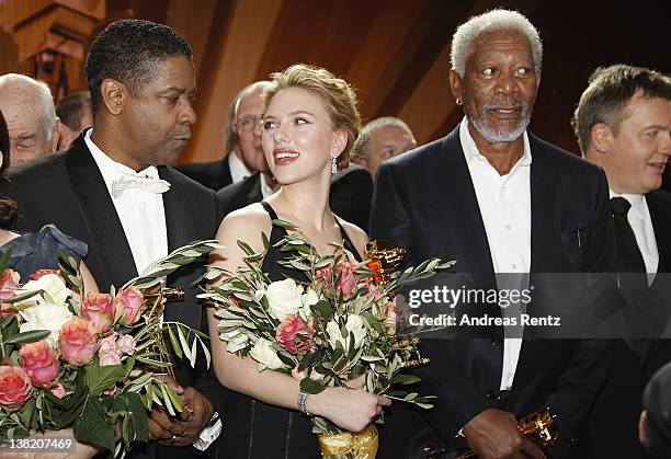 Denzel Washington,Scarlett Johansson and Morgan Freeman pose for a final picture at the 47th Golden Camera Awards at the Axel Springer Haus on...