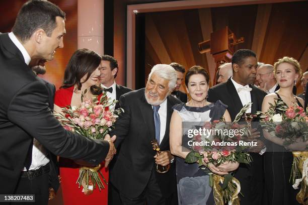 Wladimir Klitschko, Iris Berben, Oliver Berben, Mario Adorf, Hannelore Elsner, Denzel Washington and Scarlett Johansson pose for a final picture at...