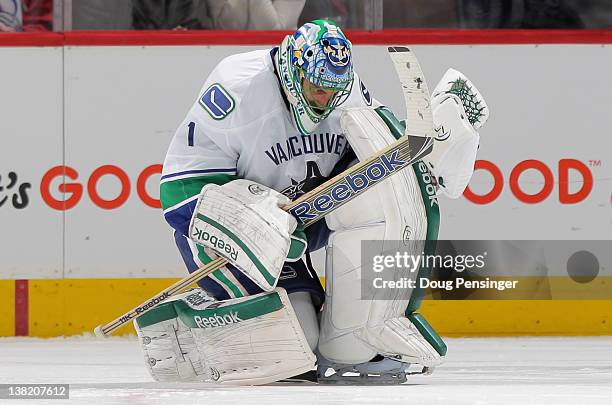 Roberto Luongo of the Vancouver Canucks celebrates after making the game winning save in a shoot out against Ryan O'Reilly of the Colorado Avalanche...