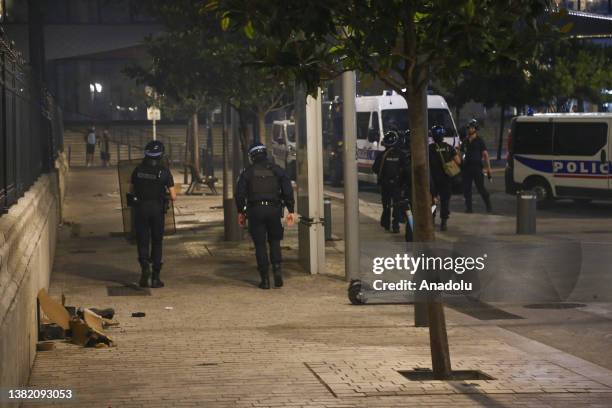 Police take security measures as people gather to protest against the death of 17-year-old Nahel, who was shot in the chest by police in Nanterre on...