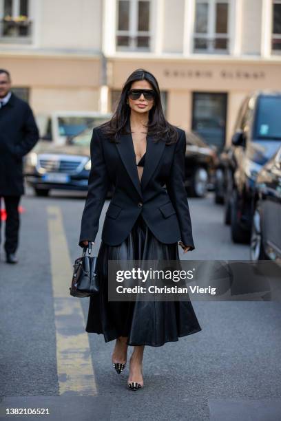 Victoria Barbara seen wearing black blazer tailored, leather skirt, bag, heels outside Valentino during Paris Fashion Week - Womenswear F/W 2022-2023...