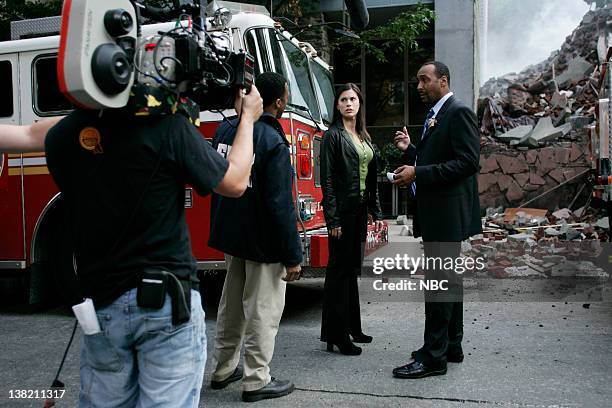 Home Sweet" Episode 3 -- Air Date -- Pictured: Unknown Cameraman, Ron Scott as Fire Marshall, Milena Govich as Detective Nina Cassady, Jesse L....