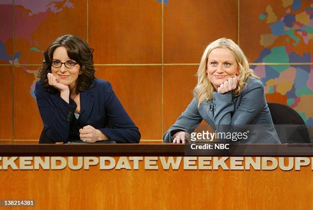 Episode 12 -- Aired -- Pictured: Tina Fey, Amy Poehler during "Weekend Update" skit on February 4, 2006