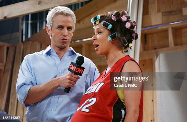 Episode 1 -- Aired -- Pictured: Seth Meyers as Anderson Cooper, Maya Rudolph as Mamie Thibodeaux during "Anderson Cooper 360" skit on October 1, 2005