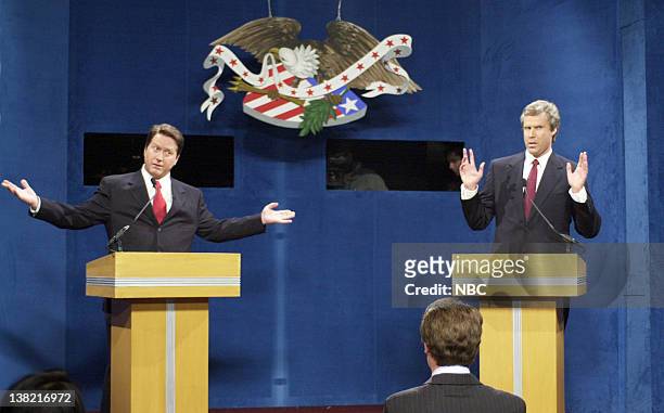 Episode 1 -- Aired -- Pictured: Darrell Hammond as Al Gore, Will Ferrell as George W. Bush during "First Presidential Debate" skit on October 10, 2000