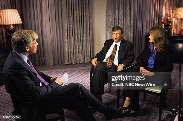 Airdate -- Pictured: Bill Gates, left, and Melinda Gates, right, appear on "Meet the Press" with moderator David Gregory in Washington, D.C., Sunday...