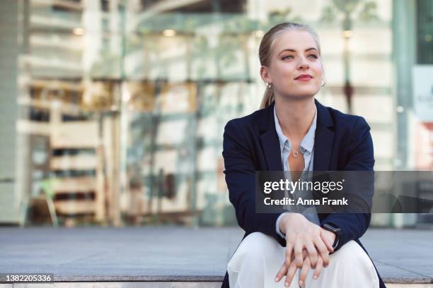 happy beautiful blonde businesswoman - dark blonde hair stock pictures, royalty-free photos & images