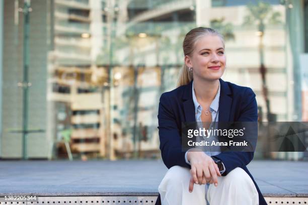 happy beautiful blonde businesswoman - dark blonde hair stock pictures, royalty-free photos & images