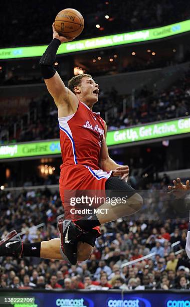 Los Angeles Clippers power forward Blake Griffin soars in for a dunk during first-quarter action against the Washington Wizards at the Verizon Center...