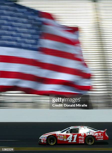 Jimmy Spencer drives his Chip Ganassi Racing Target Dodge Intrepid R/T past the Stars& Stripes during qualifying for the New Hampshire 300, part of...